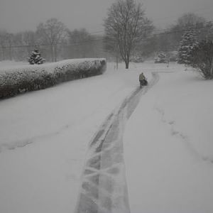 Jim snowblowing up the driveway