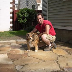 Helping clean off the patio